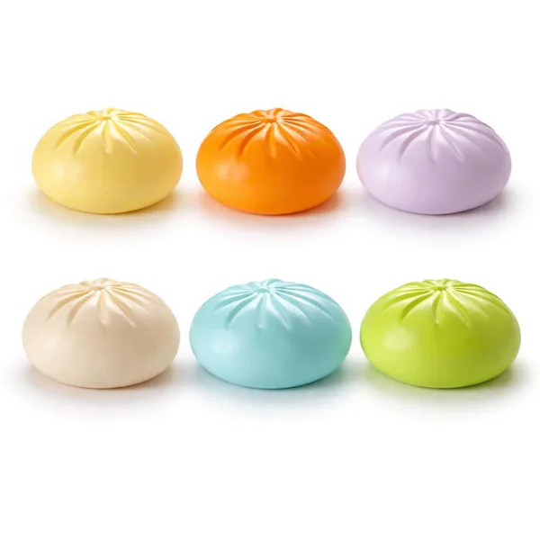 Dumpling Squeeze Toy in Steamer Box